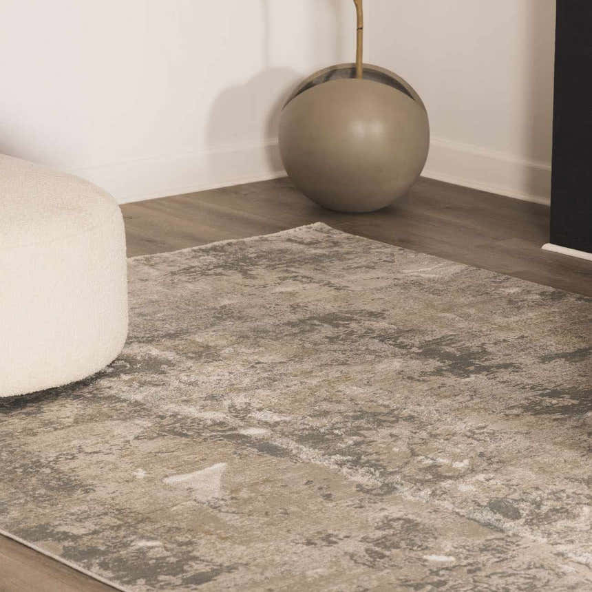 Close-up of the Pialba Thick Luxe Abstract Smokey Rug. Abstract design in taupe, gray, and white. Luxe texture. Swatch
