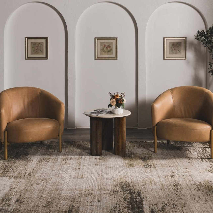 Living room scene with camel chairs and Galey Alix x Livabliss Myrtle Avenue III area rug in cream, camel, and brown tones. Roomscene-Rectangle