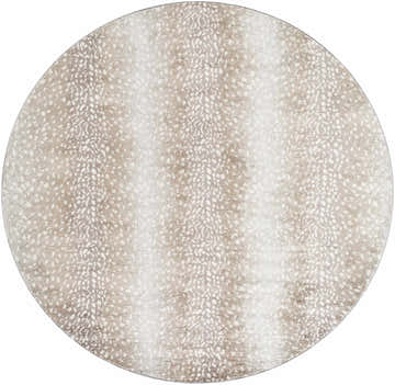 Close-up of a round Pointblank Tan Leopard Print Rug. The rug has a tan and ivory animal print pattern. Design-Round-67