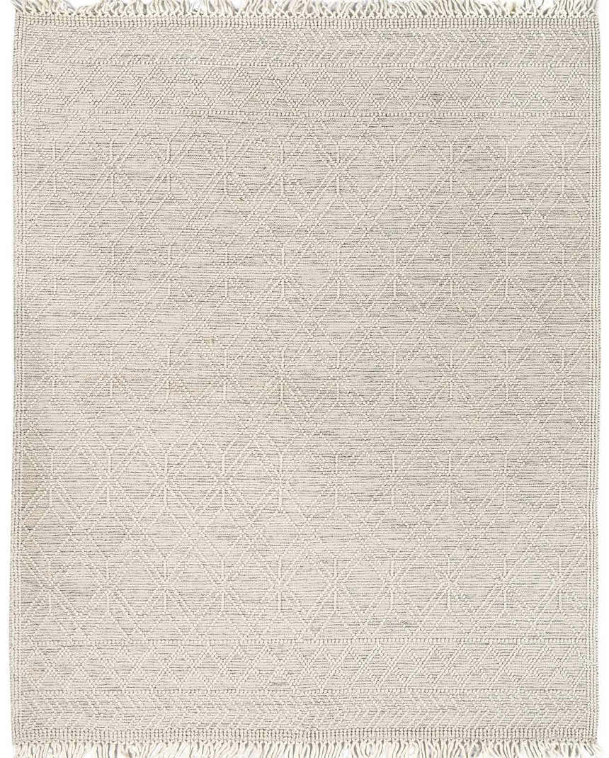 Close-up of the Ramsbury Wool Area Rug. Ivory rug with geometric diamond pattern and fringe. Hand woven texture. Design-Rectangle