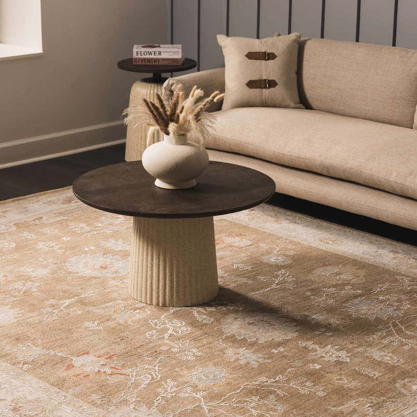 Living room scene with a beige sofa and the brown Rangeville Thick Luxe Statement Rug under a modern coffee table. Roomscene-Rectangle