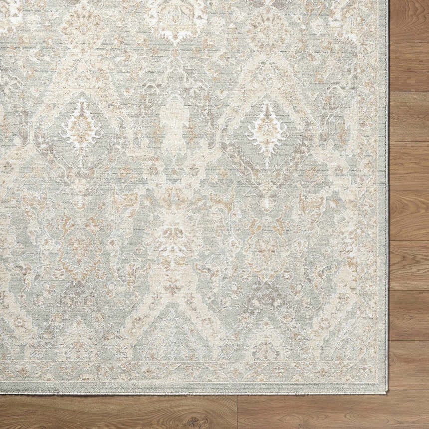 Close-up of Almaas Sage Thick Luxe Area Rug showing farmhouse style pattern and soft ivory, gray, and taupe colors. Corner