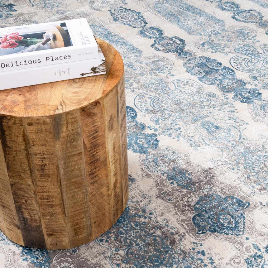 Close-up of the Rydalmere Luxury Ultra Soft Rug in blue and gray, featuring a traditional floral pattern. Styleshot