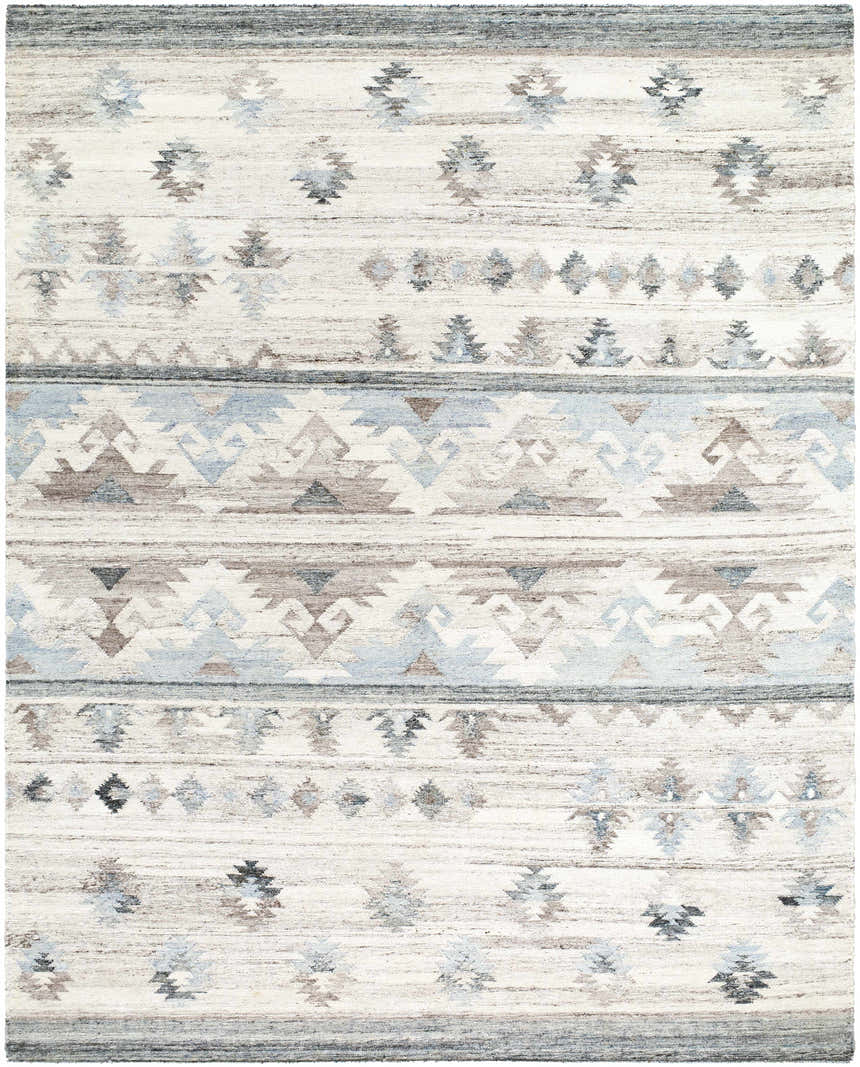Close-up of the Duyen Area Rug. Hand-woven rug with a Scandinavian and Southwestern-inspired geometric pattern in black, blue, and brown. Design-Rectangle-810