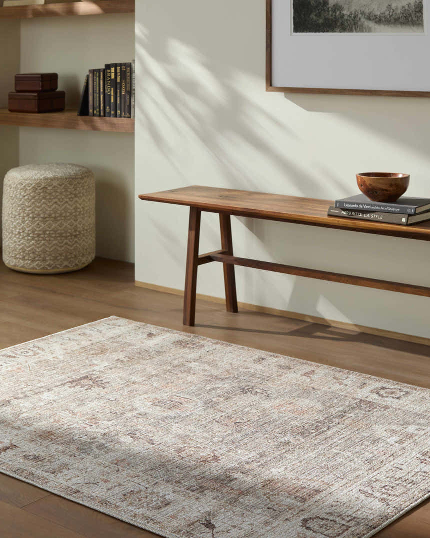 Entryway with beige Matat Area Rug, wood bench, books, and ottoman. Farmhouse style. Roomscene-Rectangle