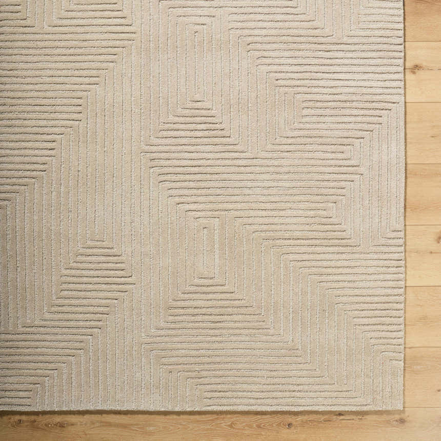 Close-up of the hand-tufted Citro Ivory Area Rug. Contemporary geometric maze pattern in neutral ivory wool. Swatch