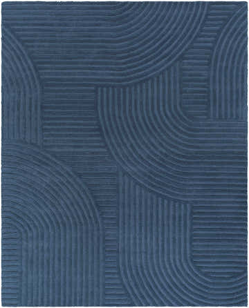 Close-up of the hand-tufted Whan Denim Area Rug, featuring a contemporary geometric pattern in shades of blue. Design-Rectangle-810