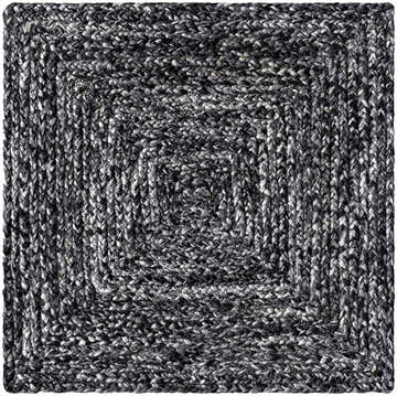 Close-up of the hand woven Kenyi Black Area Rug. Features a contemporary black and white concentric square design. Texture