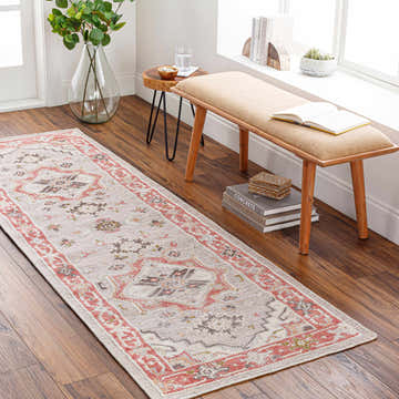 Entryway scene with a Side Premium Rug runner in brick red, beige, and gray, styled with a bench and wood accents. Roomscene-Runner