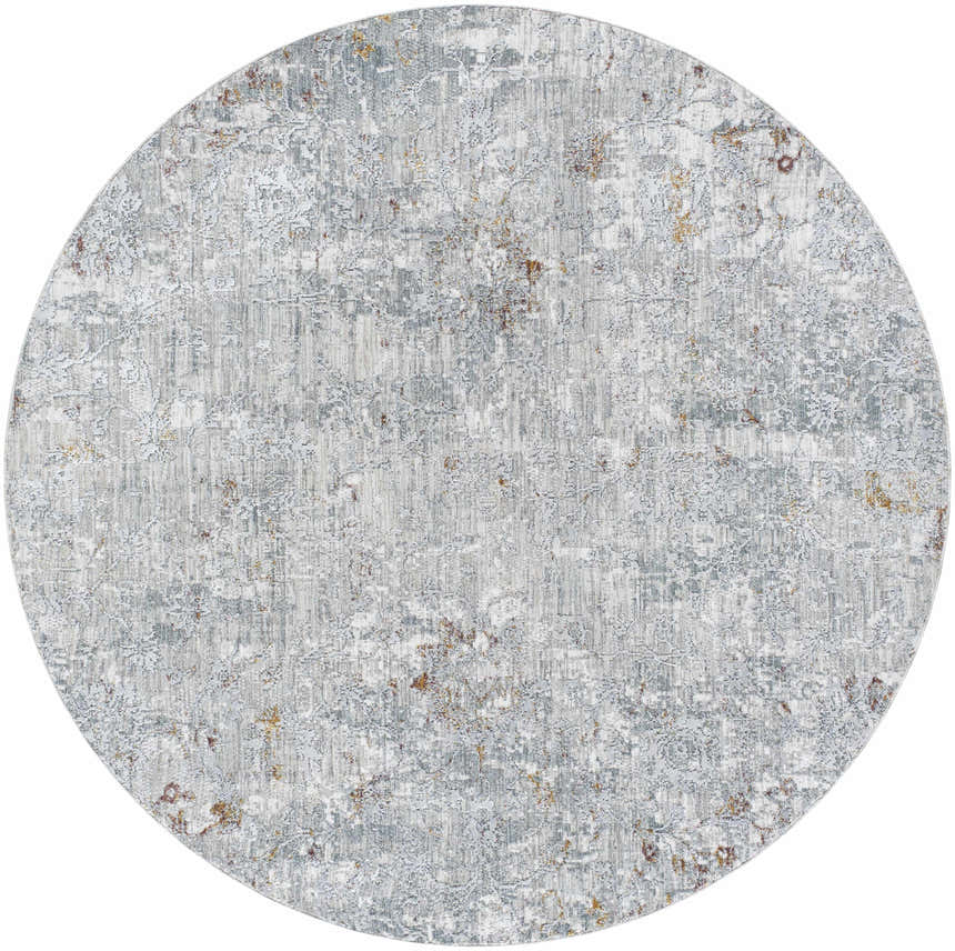 Close-up of the round Ifama Textured Rug in light gray, medium gray, light brown, and dark brown. Design-Round-67