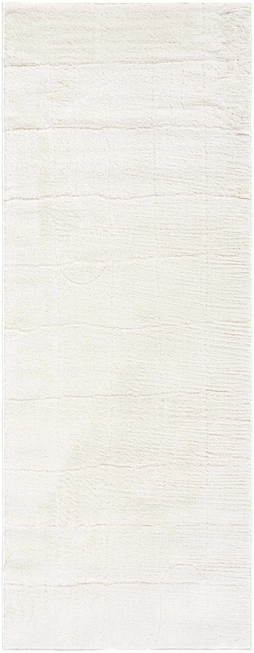 Close-up of the Keanu Ivory Area Rug. This rug features a subtle grid pattern and a soft, textured pile. Design-Runner-2773