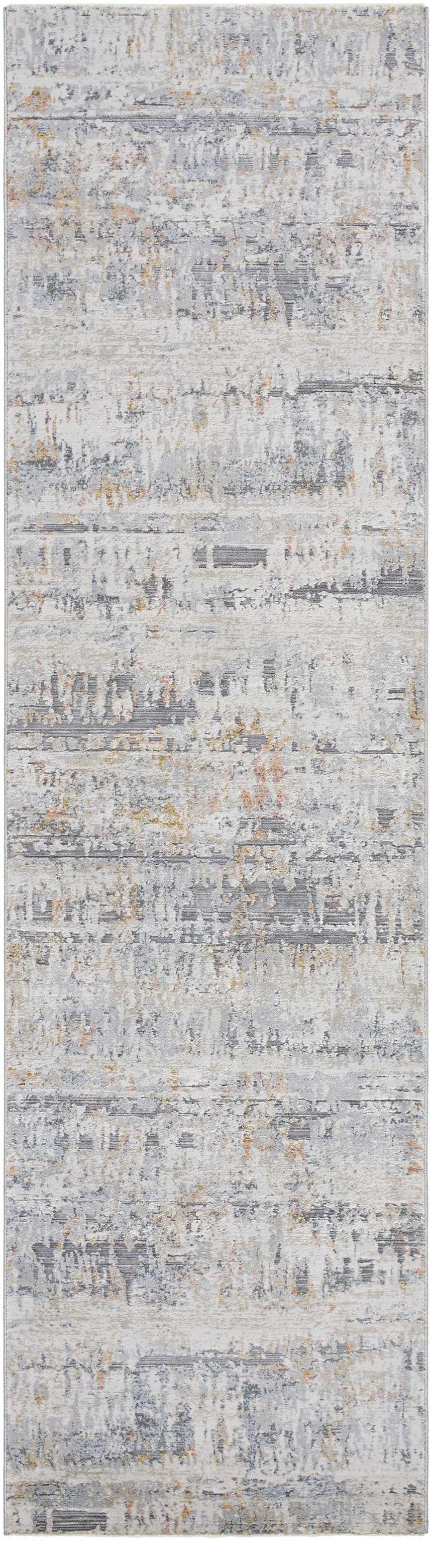 Close-up of the Guoda Area Rug featuring a contemporary driftwood, gray, and nutmeg distressed pattern. Design-Runner-2710