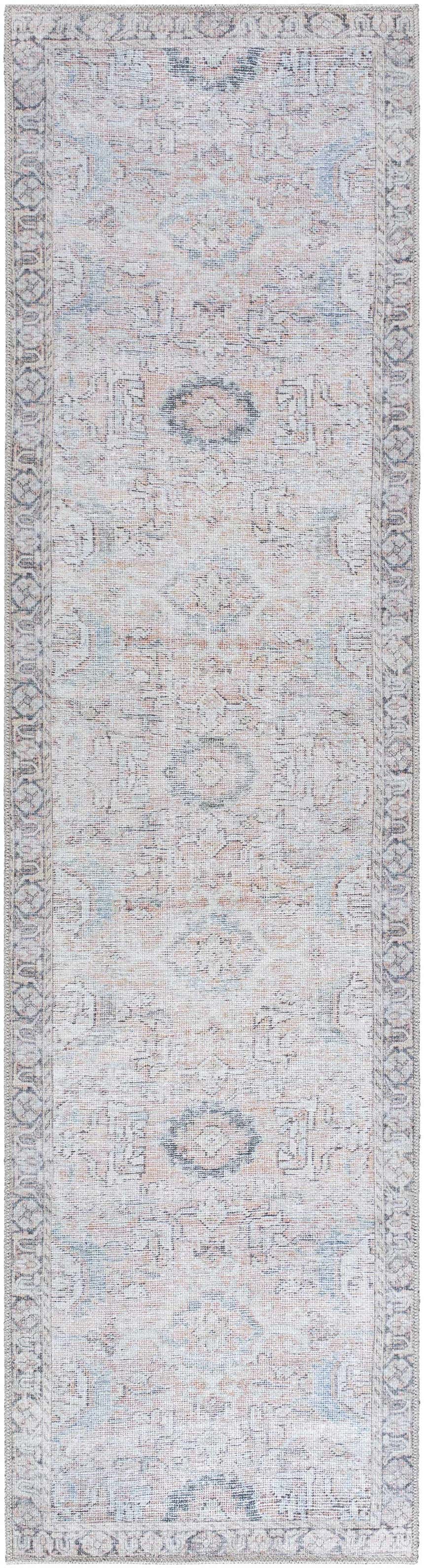 Close-up of the Giona Washable Area Rug. Traditional Persian design in blue, charcoal, light blue, light green, and pastel red. Design-Runner-2710