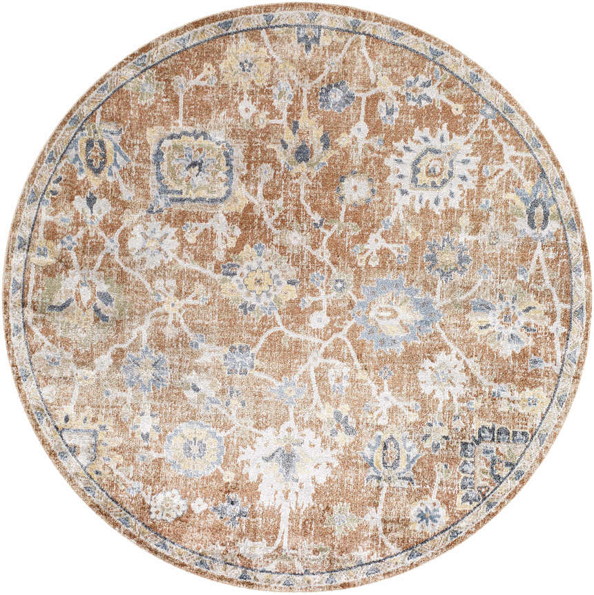 Close-up of the round Chavi Washable Area Rug. Features a traditional floral pattern in charcoal, clay, khaki, and off-white. Design-Round-67