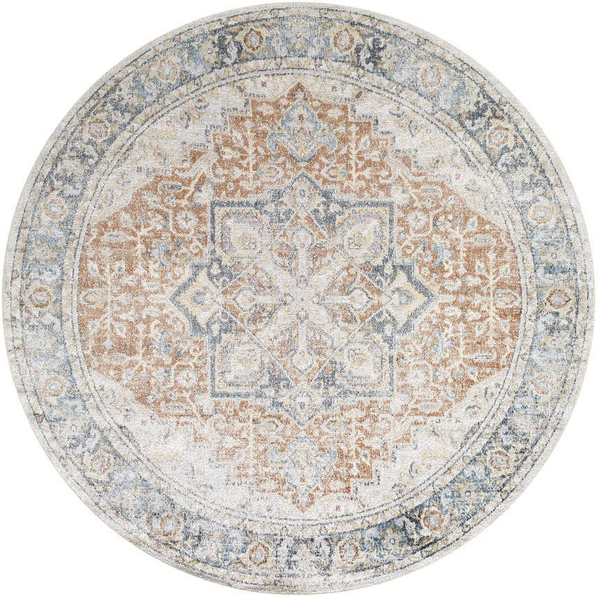 Close-up of the round Neta Red & Blue rug. Features a vintage oriental pattern in driftwood, nutmeg, and blue tones. Design-Round-67