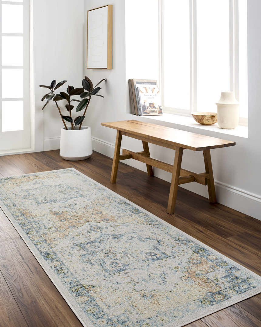 Entryway with Neta Orange & Light Blue Washable Area Rug, wood bench, plant, and bright natural light. Farmhouse style. Roomscene-Runner
