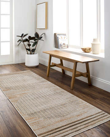 Entryway with Thad Beige Washable Area Rug, wood bench, plant, and dark wood floors. Contemporary, neutral style. Roomscene-Runner