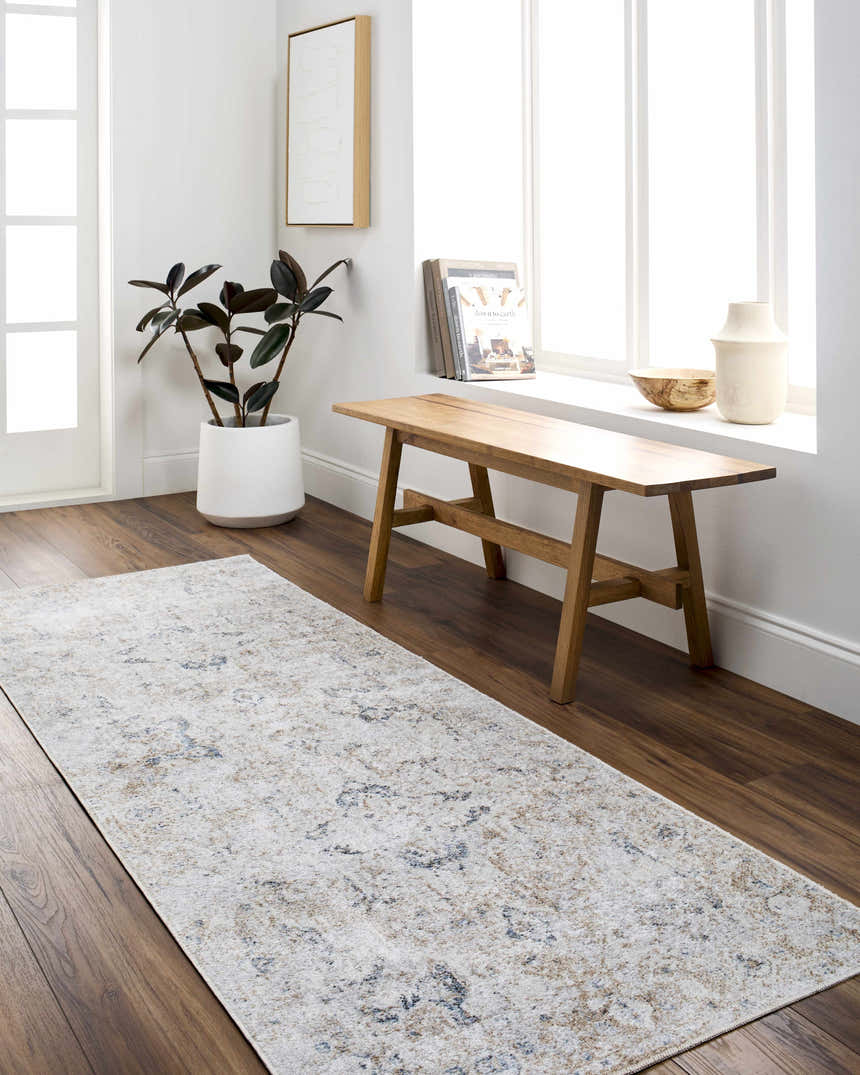 Bright hallway with Dobry Boutique Washable Rug runner in blue, tan, and off-white. Bench by window, potted plant. Roomscene-Runner