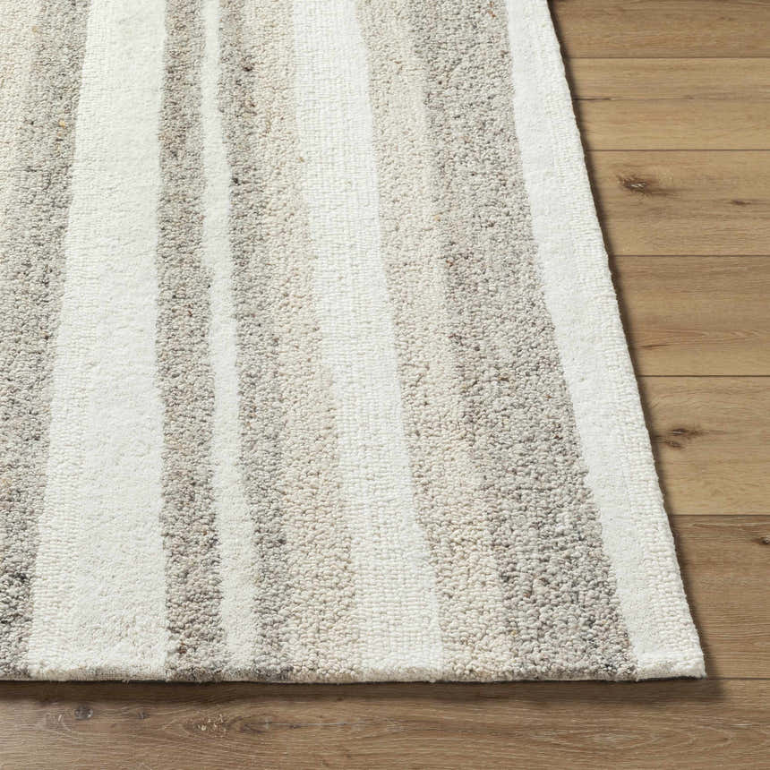 Close-up of the hand-tufted Siaju Taupe Area Rug. Features a striped pattern in taupe and white, with a textured wool pile. Front