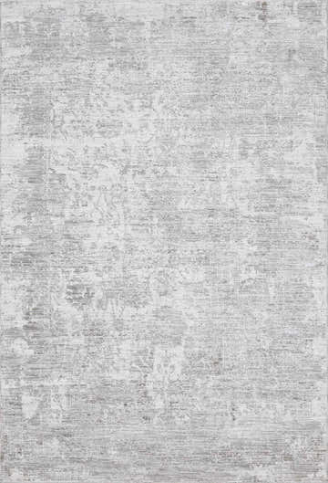 Close-up of the Jenis Gray Luxe Rug, a machine-woven rug with light and natural gray tones and a subtle traditional pattern. Design-Rectangle