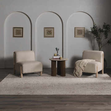 Living room scene with two chairs on a light gray Jenis Gray Luxe Rug. Roomscene-Rectangle