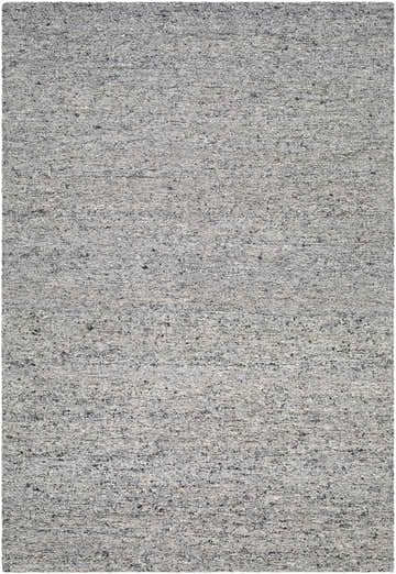 Close-up of the hand-tufted Sevan Gray Wool Area Rug, showing ash, gray, and silver gray tones and textured wool design. Design-Rectangle-576
