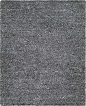 Close-up of the hand-tufted Sevan Charcoal Wool Area Rug. Features black, gray, and steel gray tones. Design-Rectangle-810