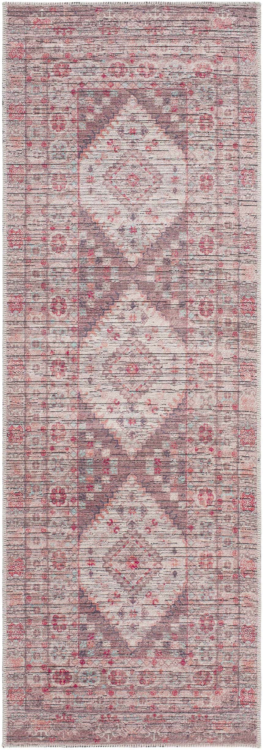 Close-up of the Liam Area Rug in beachhouse color. Farmhouse style rug with traditional floral and geometric pattern. Design-Runner-2573