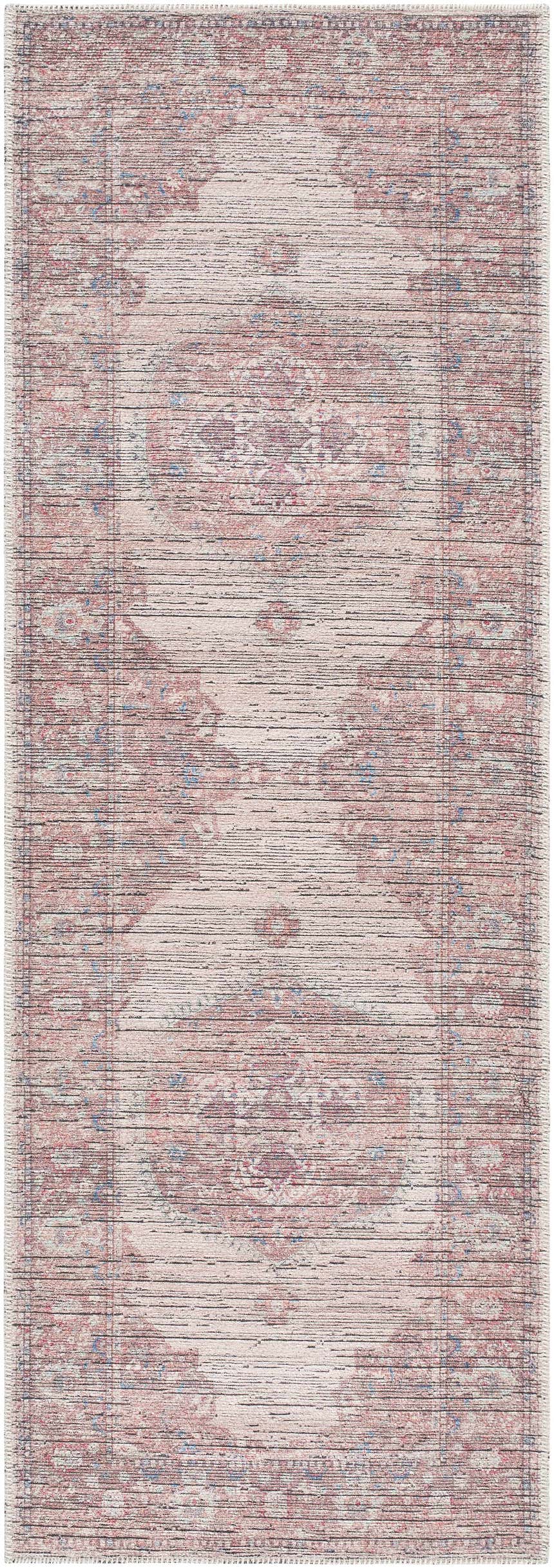 Close-up of Maja Area Rug in beachhouse color. Farmhouse style rug with traditional pattern in red, brown, and blue hues. Design-Runner-2573