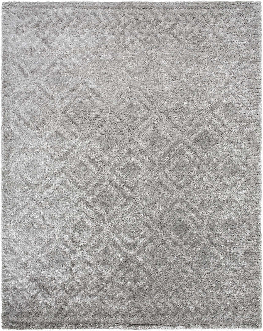 Close-up of the gray Amnon Area Rug, a shag rug with a subtle diamond pattern and soft, textured polyester fibers. Design-Rectangle-71010