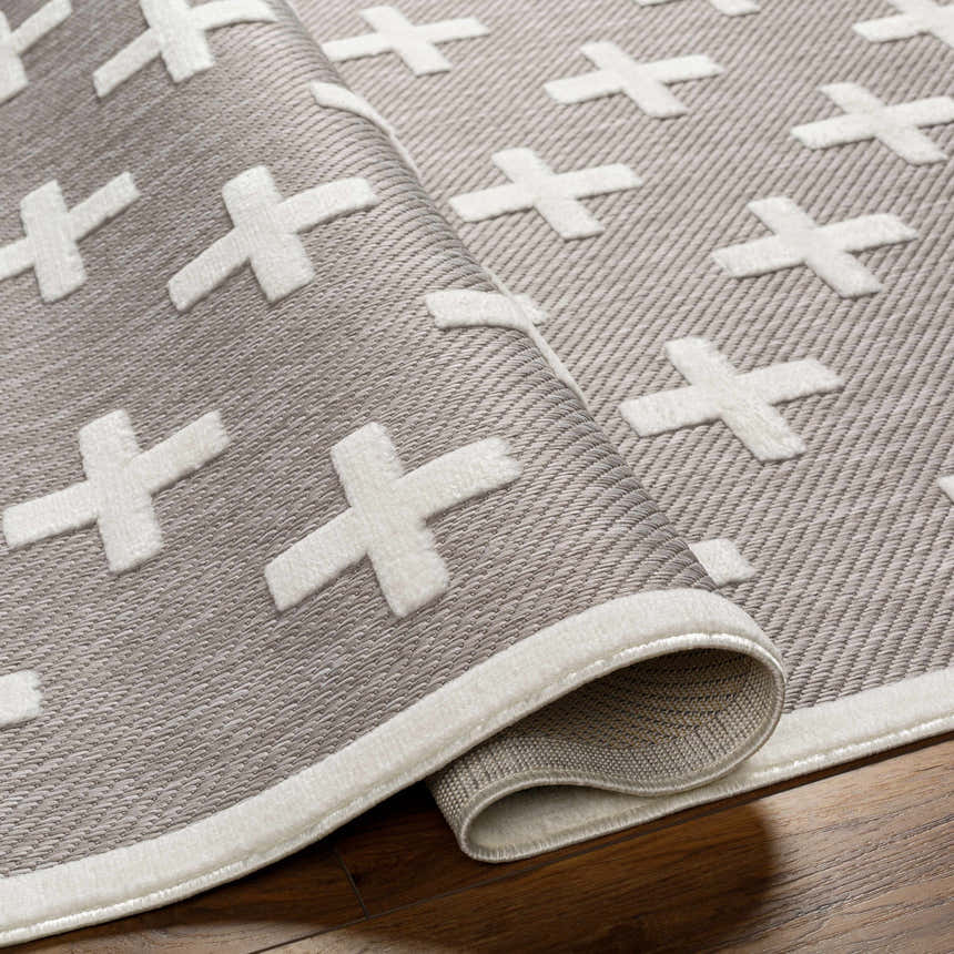Close-up of the Alvar SFG-2341 Area Rug showing a gray woven texture and raised white plus sign pattern. Fold
