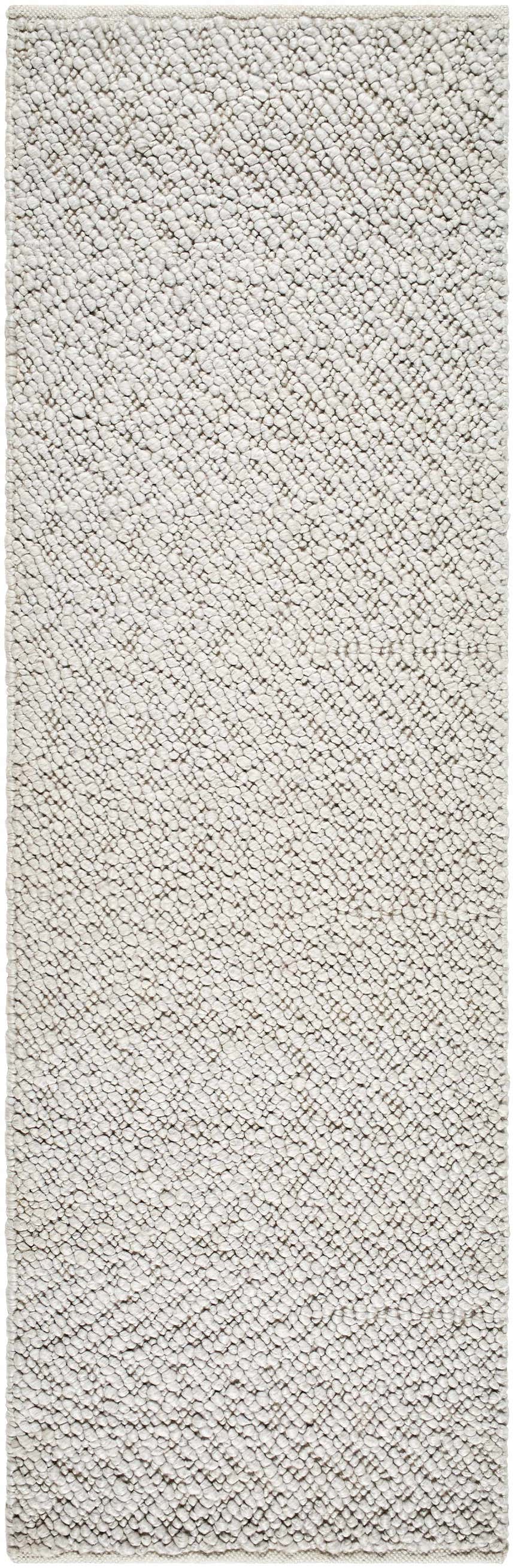 Close-up of the hand woven Oved Area Rug. Neutral cloud gray color and textured, contemporary design. Design-Runner-268