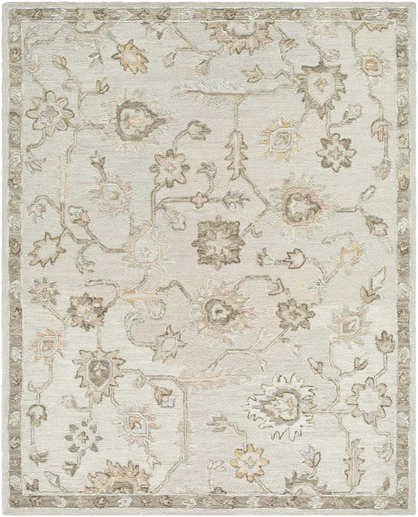 Close-up of the Adelle Tufted Oushak Area Rug. Beige wool rug with a traditional floral pattern in tan and brown. Hand-tufted texture. Design-Rectangle-810