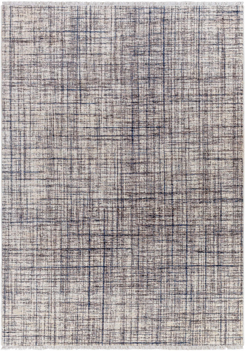 Close-up of the Taysan Area Rug, showcasing its dark gray, purple, and taupe linear pattern and soft polyester texture. Design-Rectangle-57