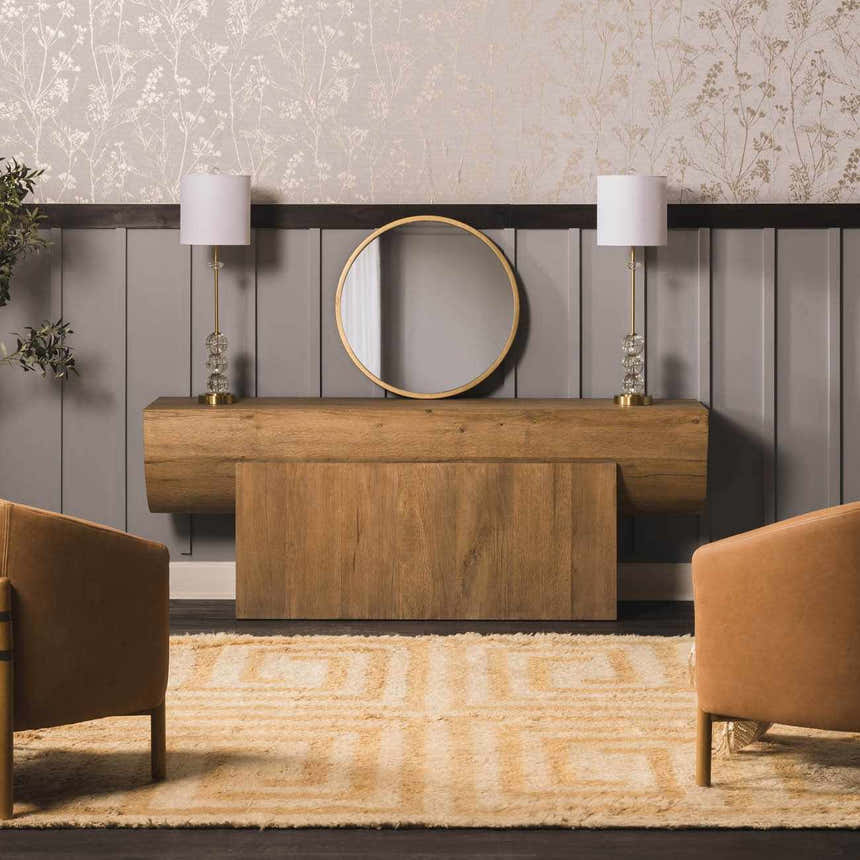 Entryway scene with a tan Wasim Area Rug, wood console table, round mirror, and camel-colored chairs. Roomscene-Rectangle
