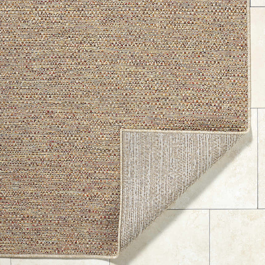 Close-up of the Thanh Beige Area Rug showing woven texture and colors: beige, coral, mustard, and terracotta. Fold