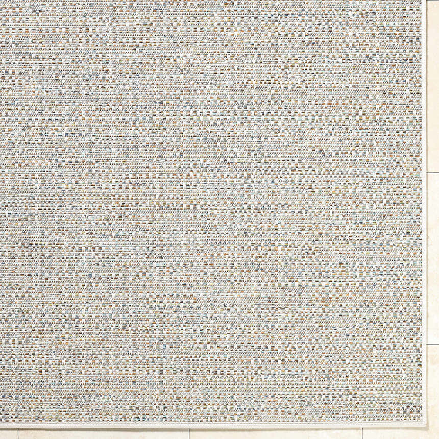 Close-up of the Thanh Ivory Area Rug showing its woven texture with ivory, gray, and sandstone colors. Corner