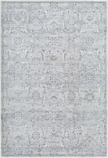 Close-up of the Tariq Area Rug. Machine-woven with a traditional floral pattern in silver gray, slate blue, and sterling gray. Design-Rectangle-537