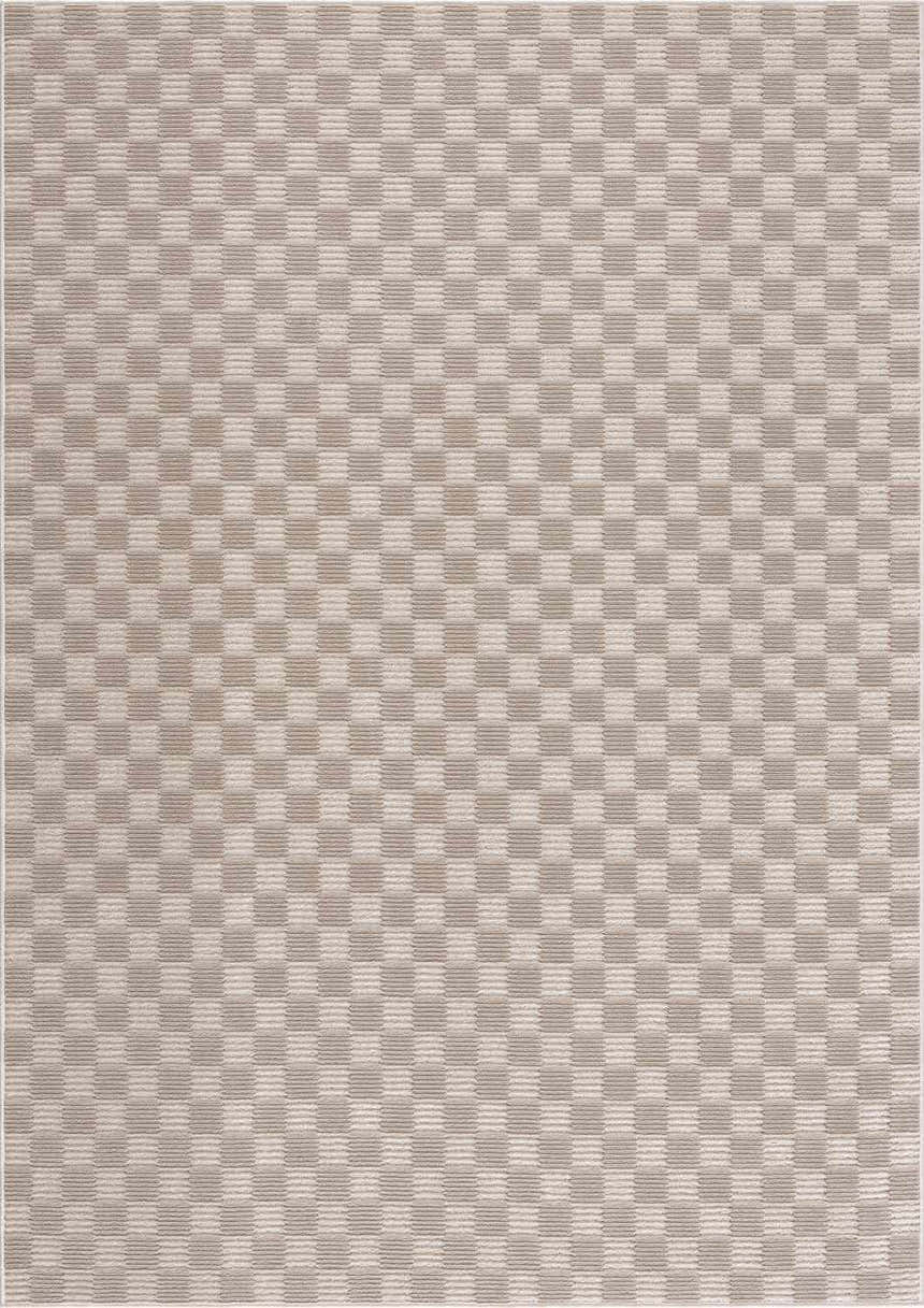 Close-up of Truls 3D Checkered Washable Rug - Biscotti. Beige, cream, and peach checkered pattern. Machine woven polyester rug. Design-Rectangle-5373