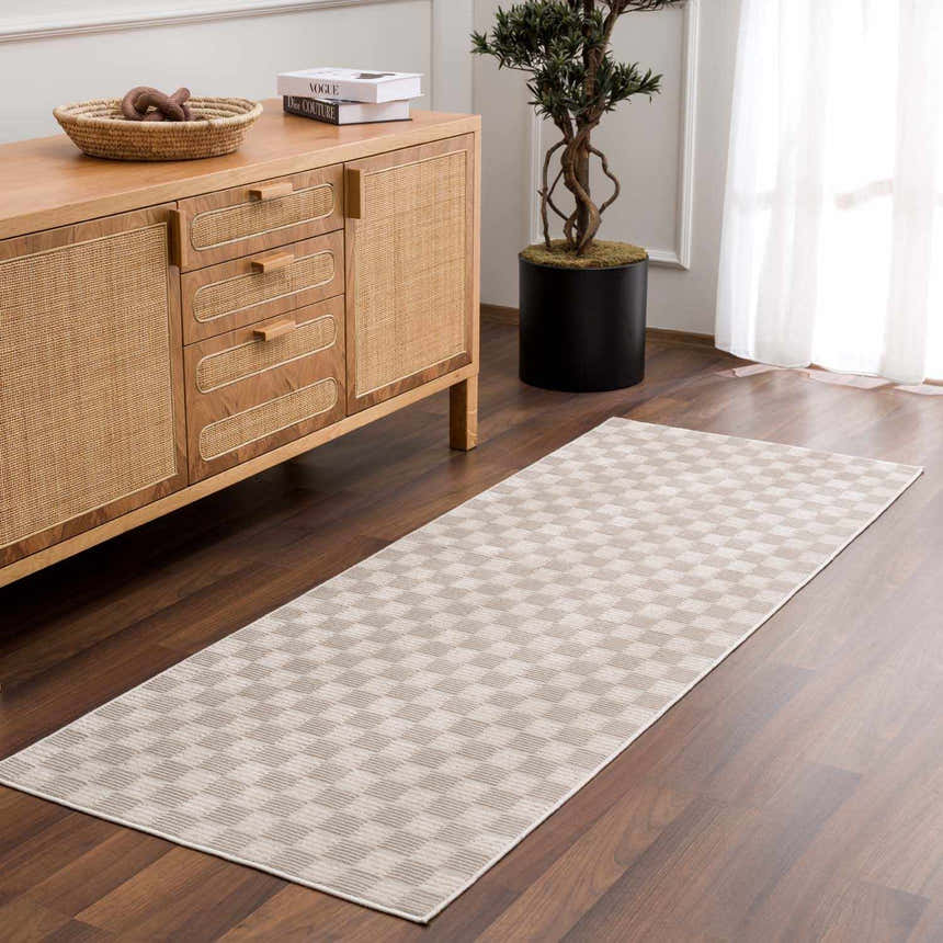 Hallway scene with a biscotti Truls 3D Checkered Washable Rug, wood floors, console table, and potted plant. Roomscene-Runner