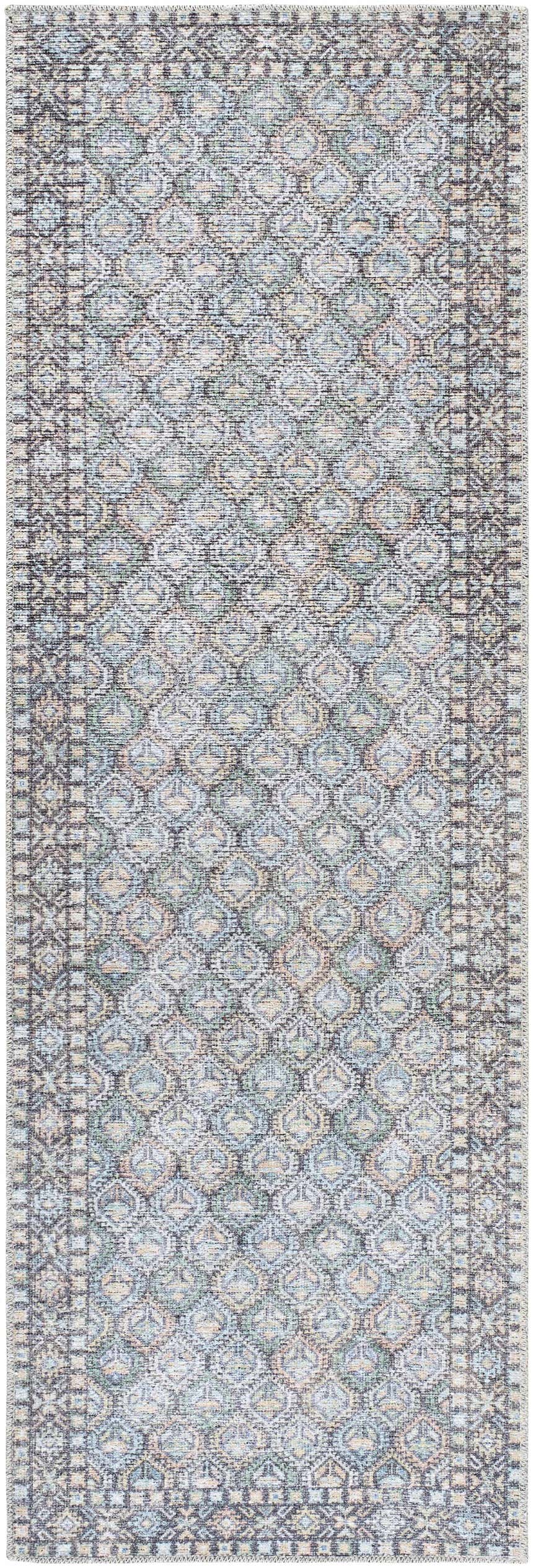 Close-up of the Telma Medium Green Washable Area Rug. Features a traditional diamond pattern in green, blue, cream, and black. Design-Runner-27710