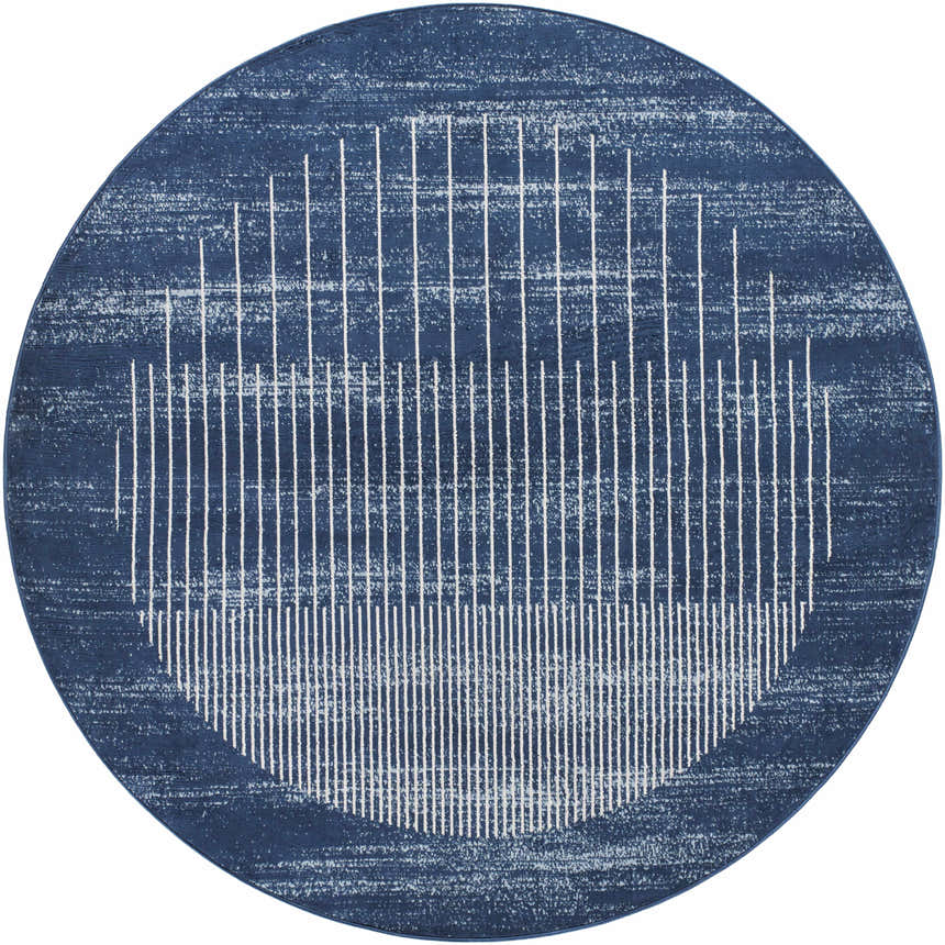 Close-up of round Urja Area Rug. Blue rug with a geometric pattern of white lines. Contemporary style. Design-Round-67