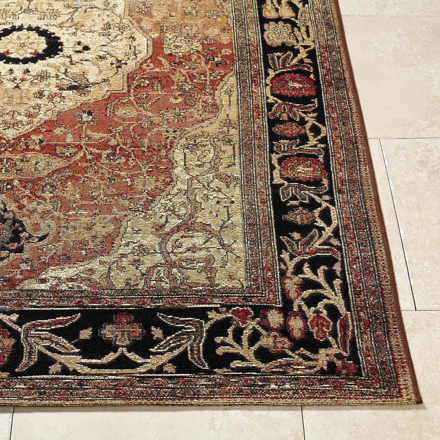 Close-up of the Vonda Area Rug, showcasing its traditional design, charcoal floral border, and crimson and gold accents. Front