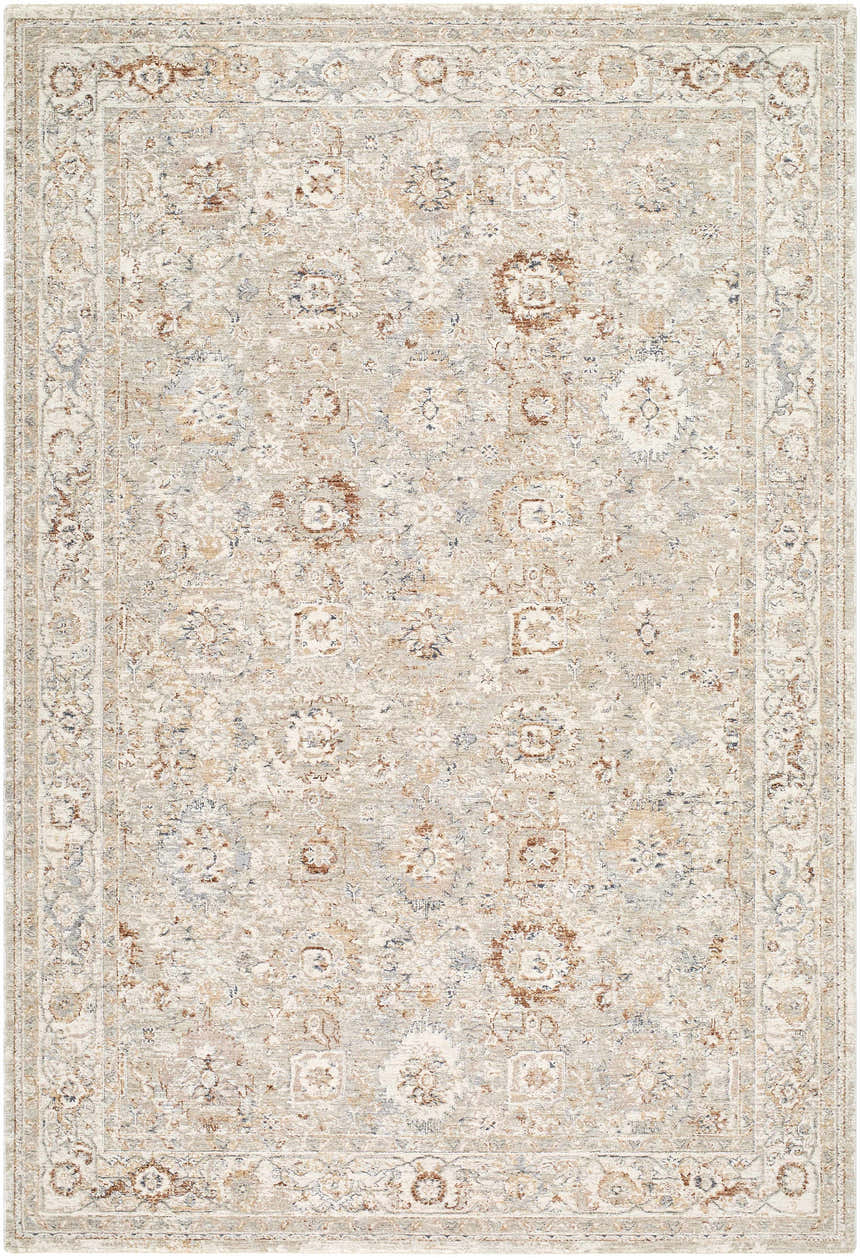 Close-up of the Vidar Blue Area Rug, a farmhouse style rug with a traditional floral pattern in beige, brown, and blue tones. Design-Rectangle-6796