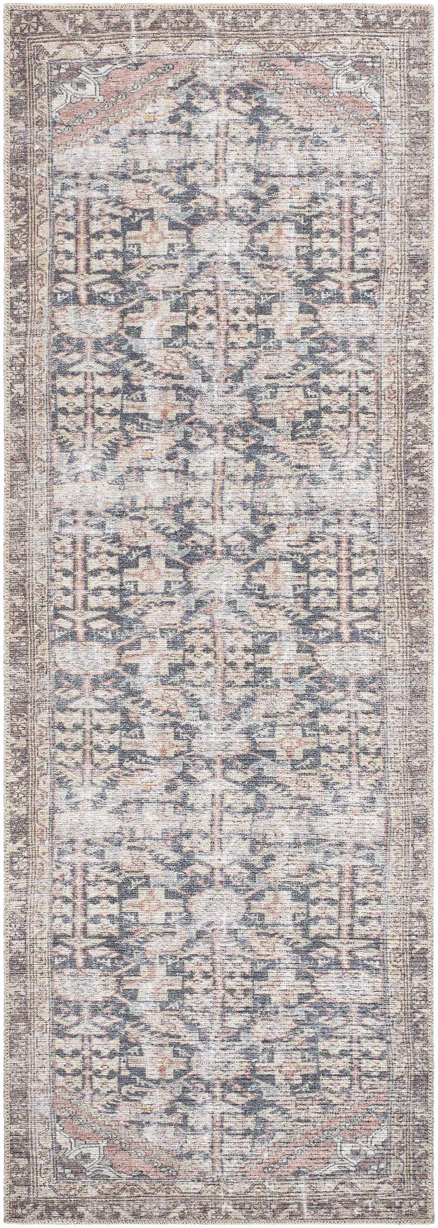 Close-up of the Valar Washable Area Rug, featuring a traditional pattern in beige, black, and cream hues. Design-Runner-27710