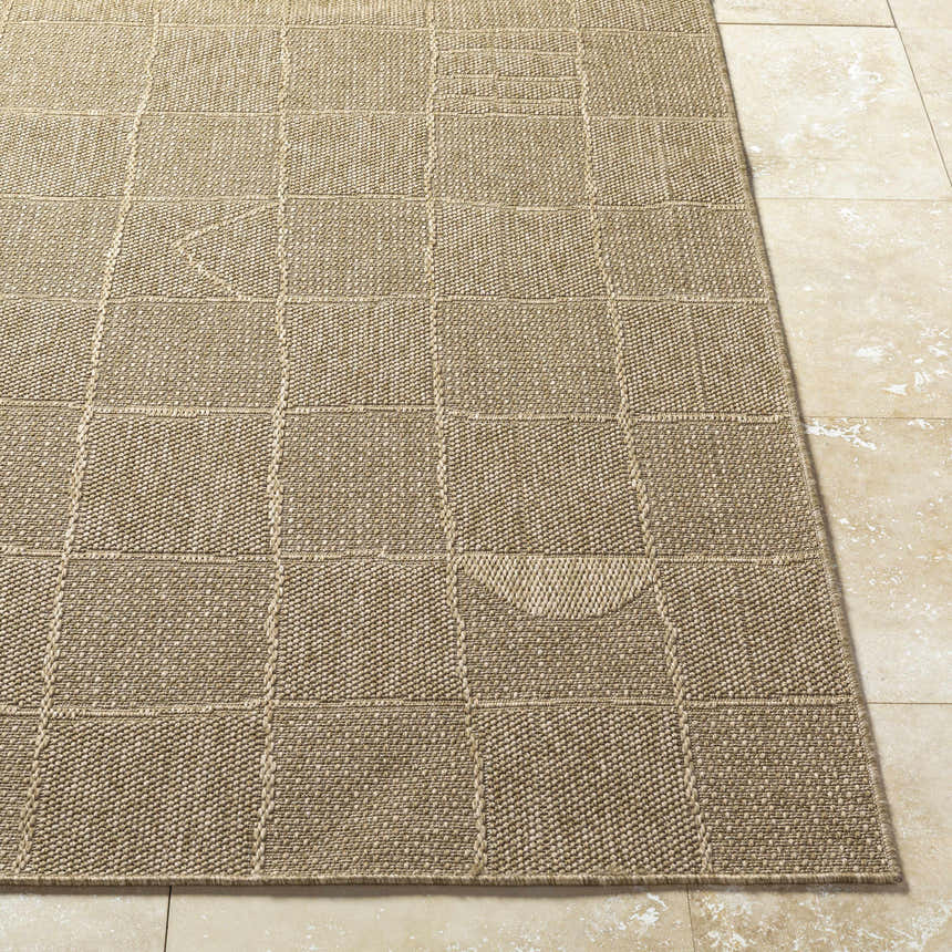 Close-up of the Veras Beige Area Rug showing its woven texture and dark brown grid pattern on a cream-colored tile floor. Front