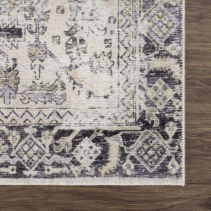 Close-up of Holi-4606 Washable Area Rug. Black and gold traditional vintage pattern on a rectangular rug. Swatch