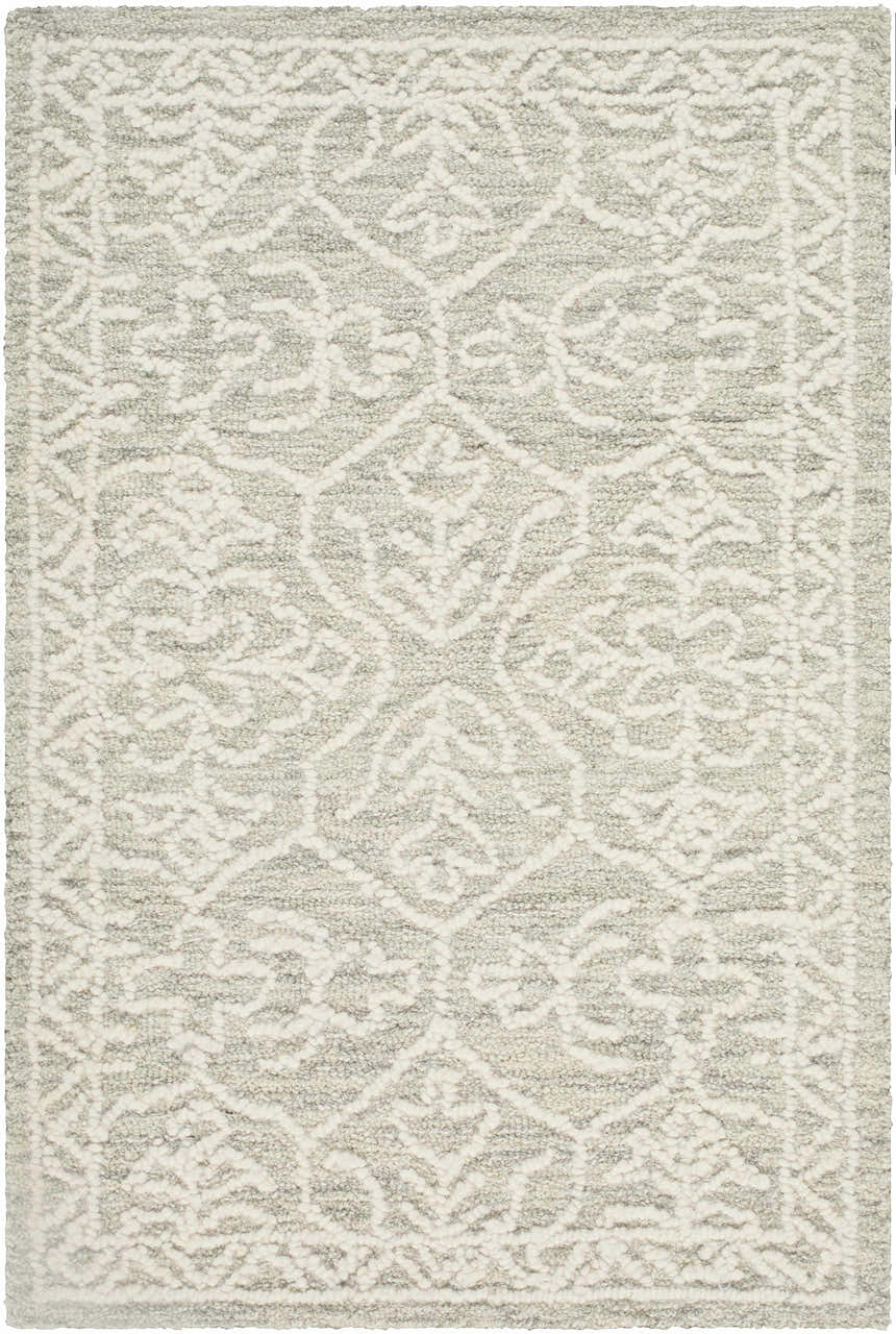 Close-up of the Yadid Gray Wool Area Rug featuring a traditional light silver and gray floral pattern. Design-Rectangle