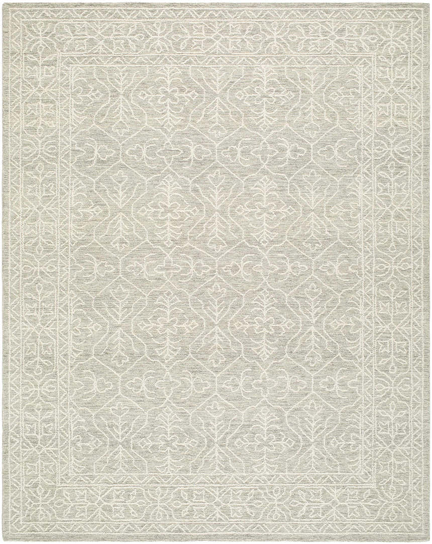 Close-up of the hand-tufted Yadid Gray Wool Area Rug featuring a traditional light silver and off-white floral pattern. Design-Rectangle-71010