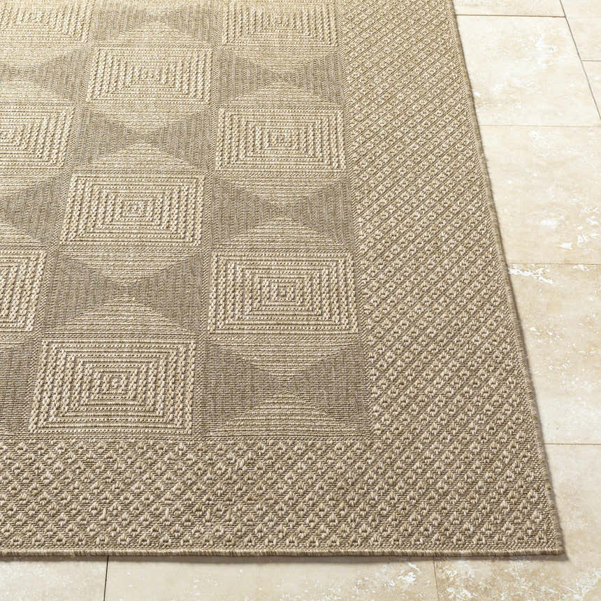 Close-up of the Anabia Brown Area Rug showing the geometric square pattern and textured weave in prairie dust and tan colors. Front